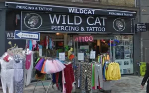Wildcat piercing og tattoo